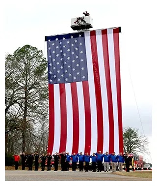 U.S. flag banner at Officer Jody Smith's funeral