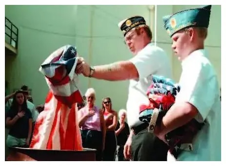 Disposing of U.S. flag by burning