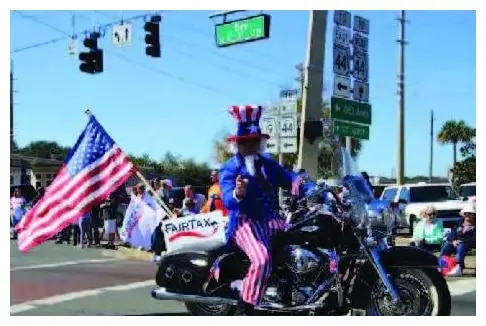 Flag hanging off of motorcycle