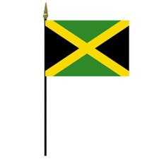 Jamaican flag on pole with gold top