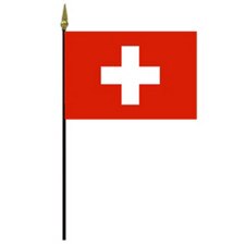 Swiss flag on black pole