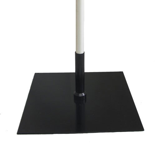 Metal stand with a flagpole