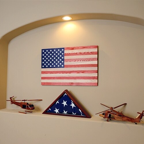 American flag with wooden helicopte