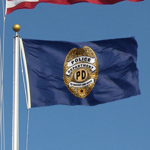 police department flag with badge