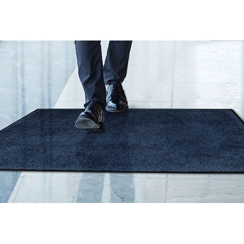 person walking on black mat