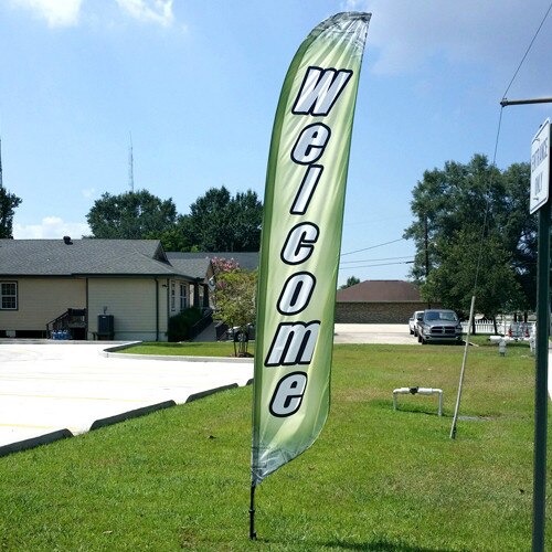 Welcome banner in green field