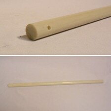 round wooden stick with hole