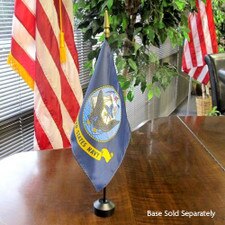 navy flag on table with potted plan