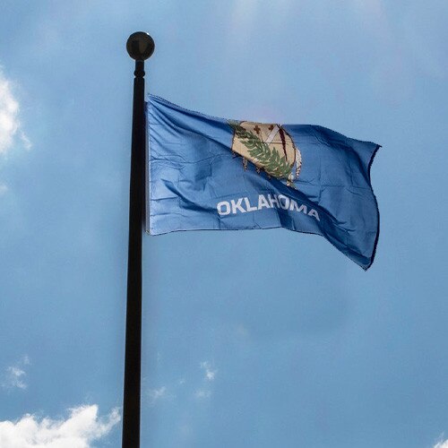 Oklahoma flag display on a flagpole